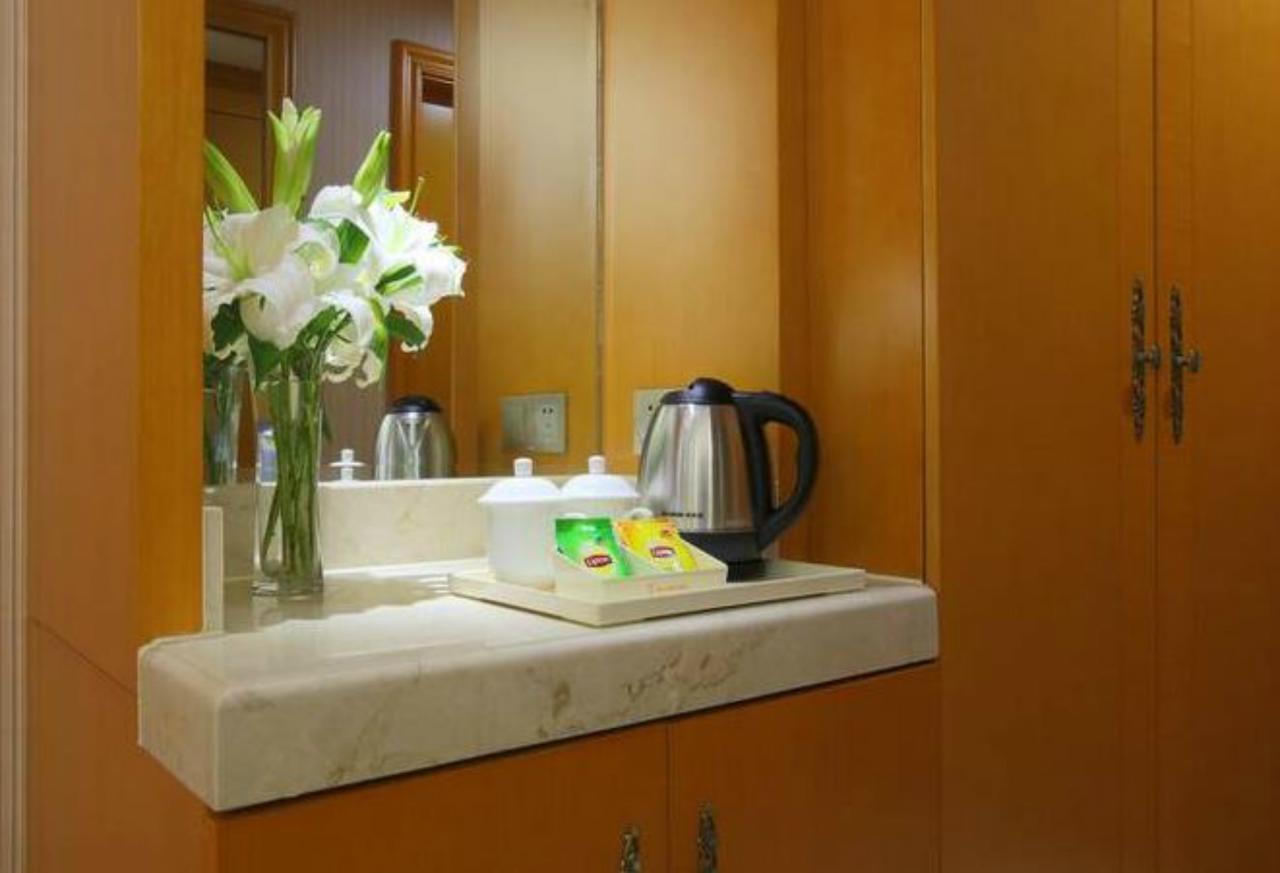 Venus International Hotel Shanghai South Shenjiang Road Exteriör bild